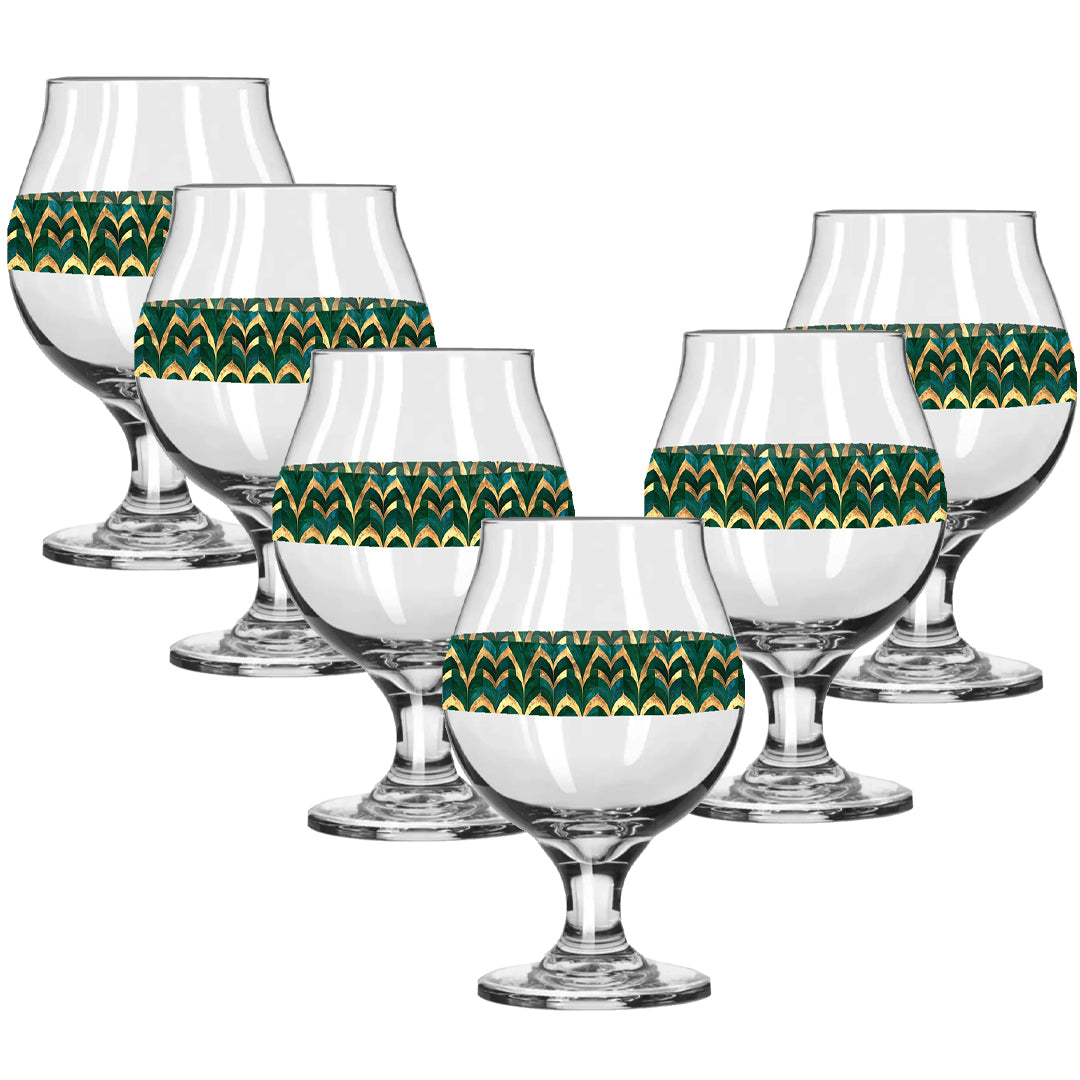 Set of eight Belgian beer glasses with green and gold geometric pattern on a white background