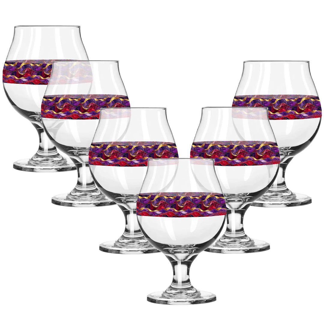 Set of six glass snifters with purple and gold colorful pattern on a white background