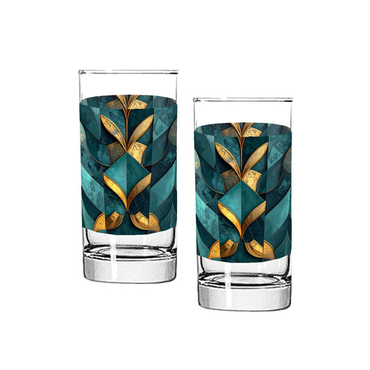 Two highball glasses with a teal and gold geometric patter on a white background