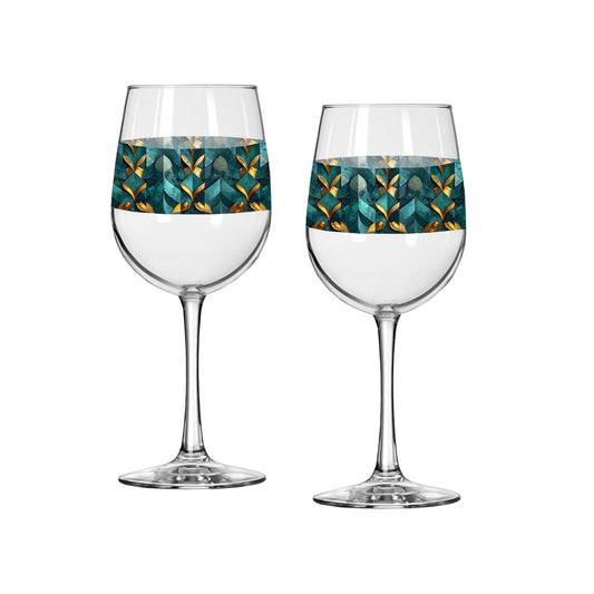 Two tall wine glasses with teal and gold geometric design on a white background