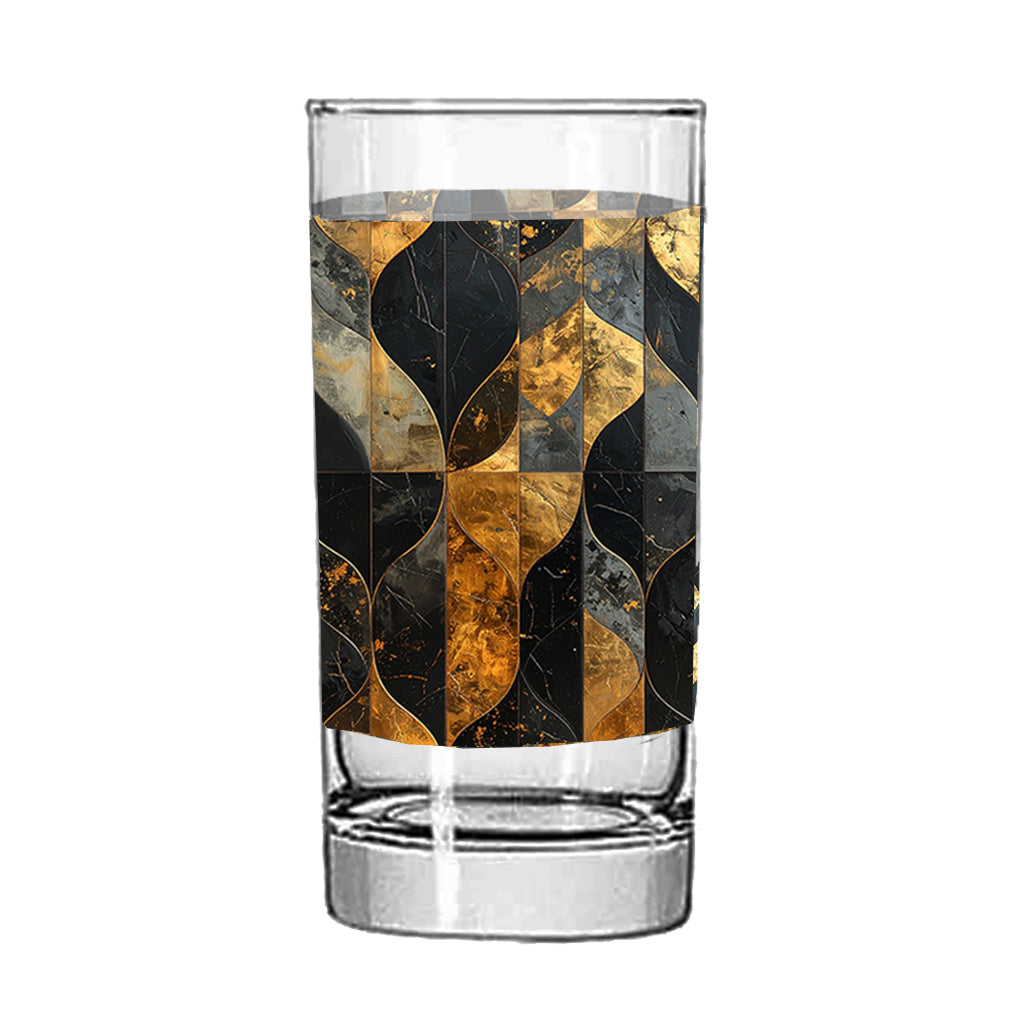 Highball glass with a charcoal and bronze geometric design on a white background