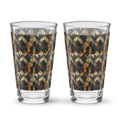 Two pint beer glasses with charcoal and bronze geometric design on a white background