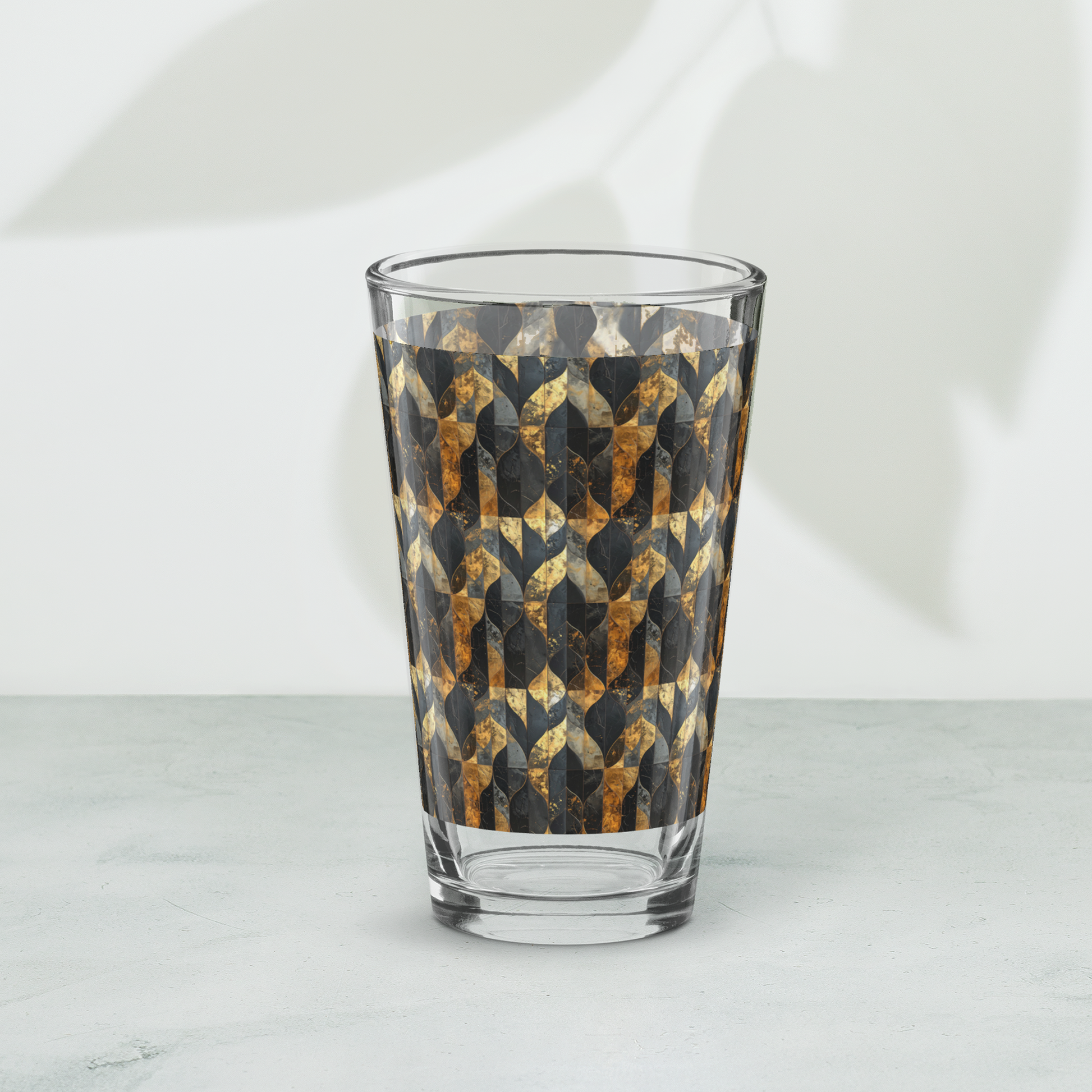 Aged Elegance charcoal and bronze pattern pint beer glass on a white background