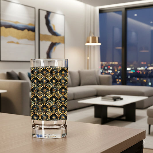 Astral Glow highball glass with  a black and bronze design on a table in a modern living room.