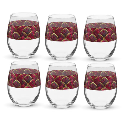 Set of six clear Crimson Jewels stemless wine glasses with red and gold geometric patterns on a white background