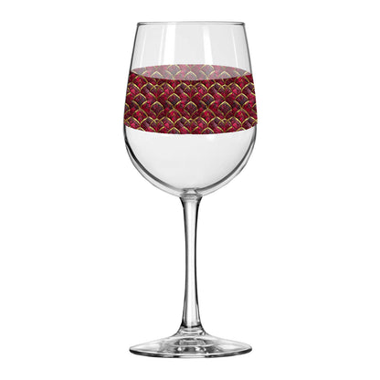 Crimson Jewels wine glass with a red and gold decorative band on a white background