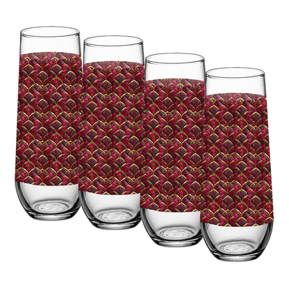 Four glass stemless champagne glasses with red and gold patterned sleeves on a white background