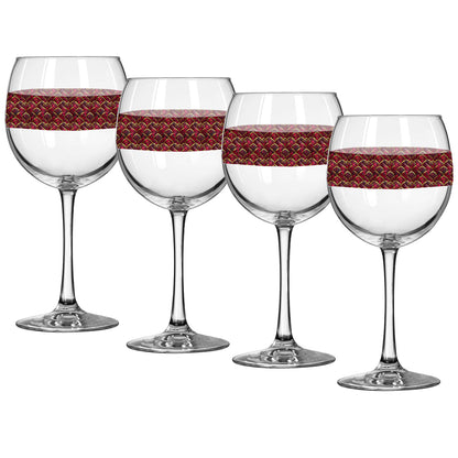 Four wine glasses with red woven bands on a white background