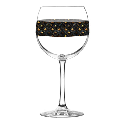 Balloon wine glass with black and gold diamond design on a white background