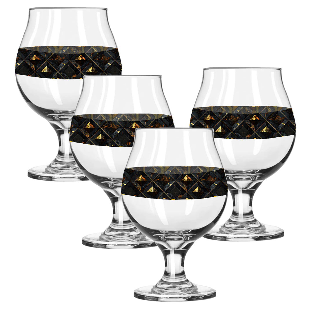 Set of four Belgian beer glasses with black and gold diamond design on a white background