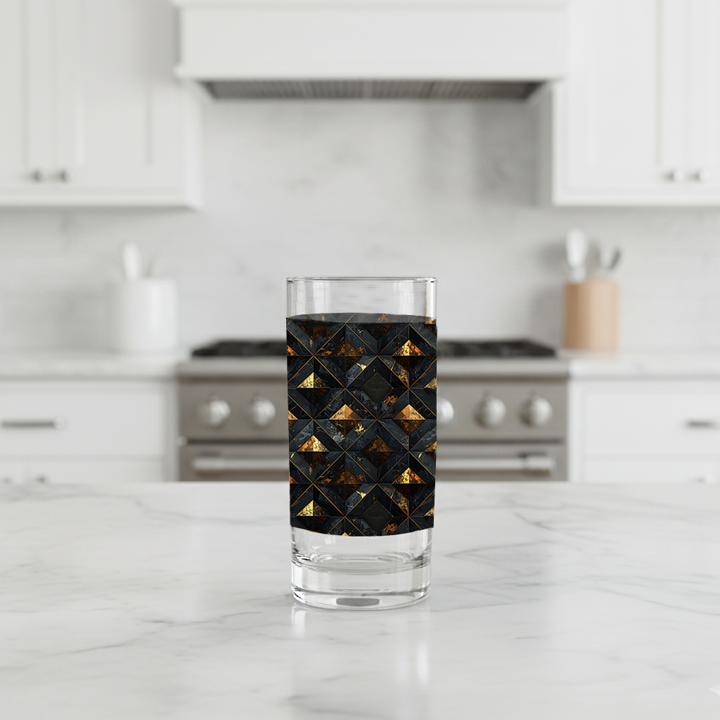 Gilded Decay highball glass and cocktail with charcoal and gold geometric pattern on a kitchen counter