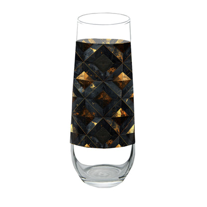 Stemless champagne glass with a black and gold geometric pattern on a white background
