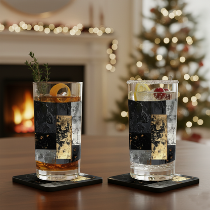 Two Frescro Fragments pattern highball glasses with cocktails on black coasters with a festive background featuring a fireplace and Christmas tree.