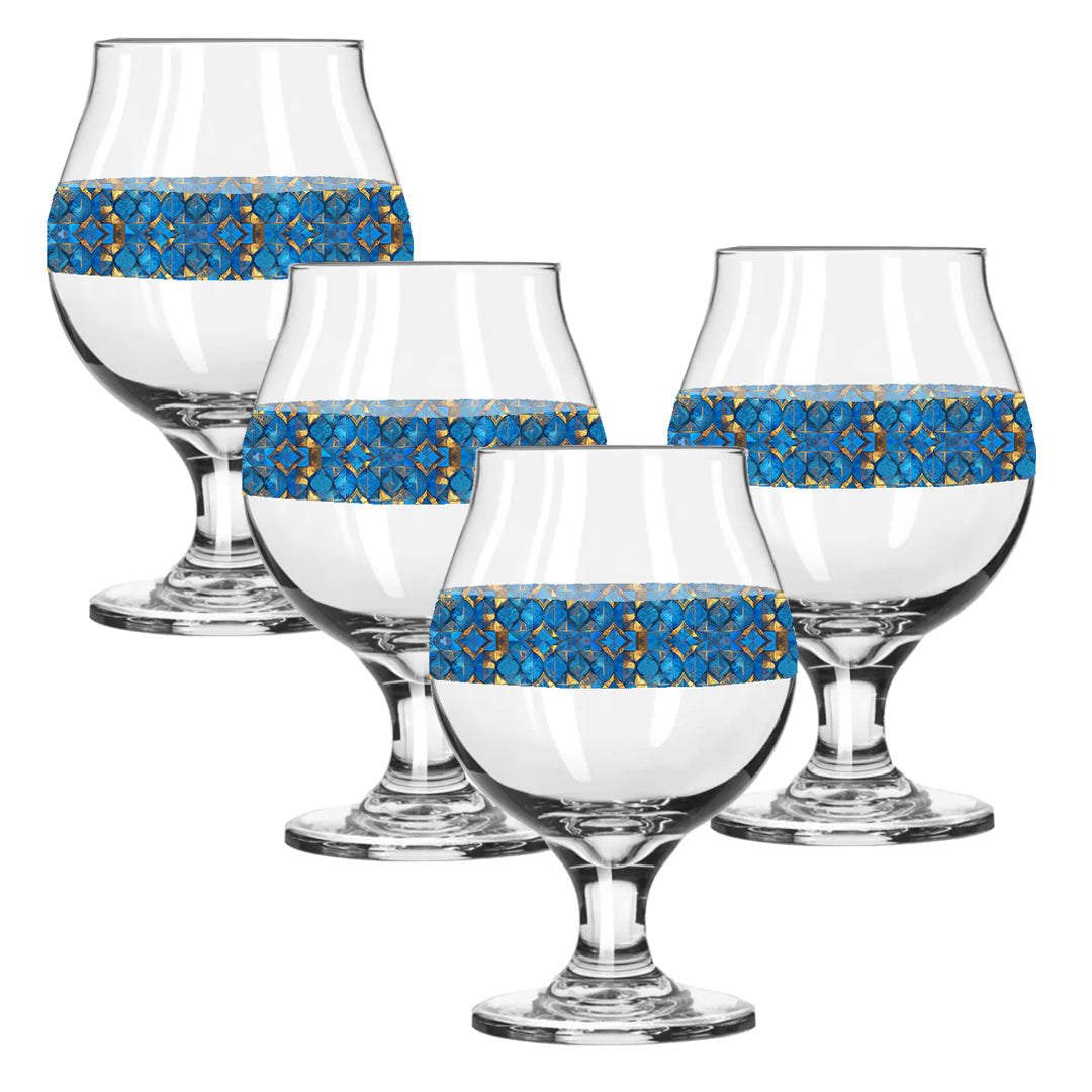 Set of four Belgian beer glasses with turqoise and gold geometric design on a white background