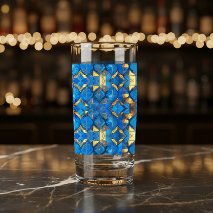Moroccan Treasure highball glass with turqoise and gold geometric design on a bar counter
