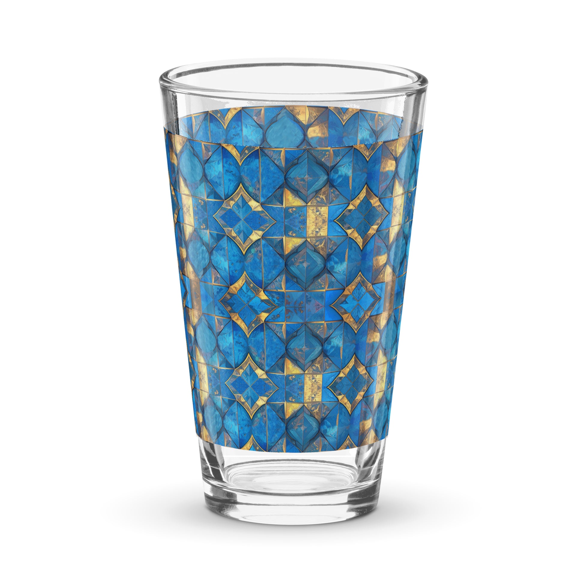 Clear pint beer glass with turqoise and gold geometric design on a white background