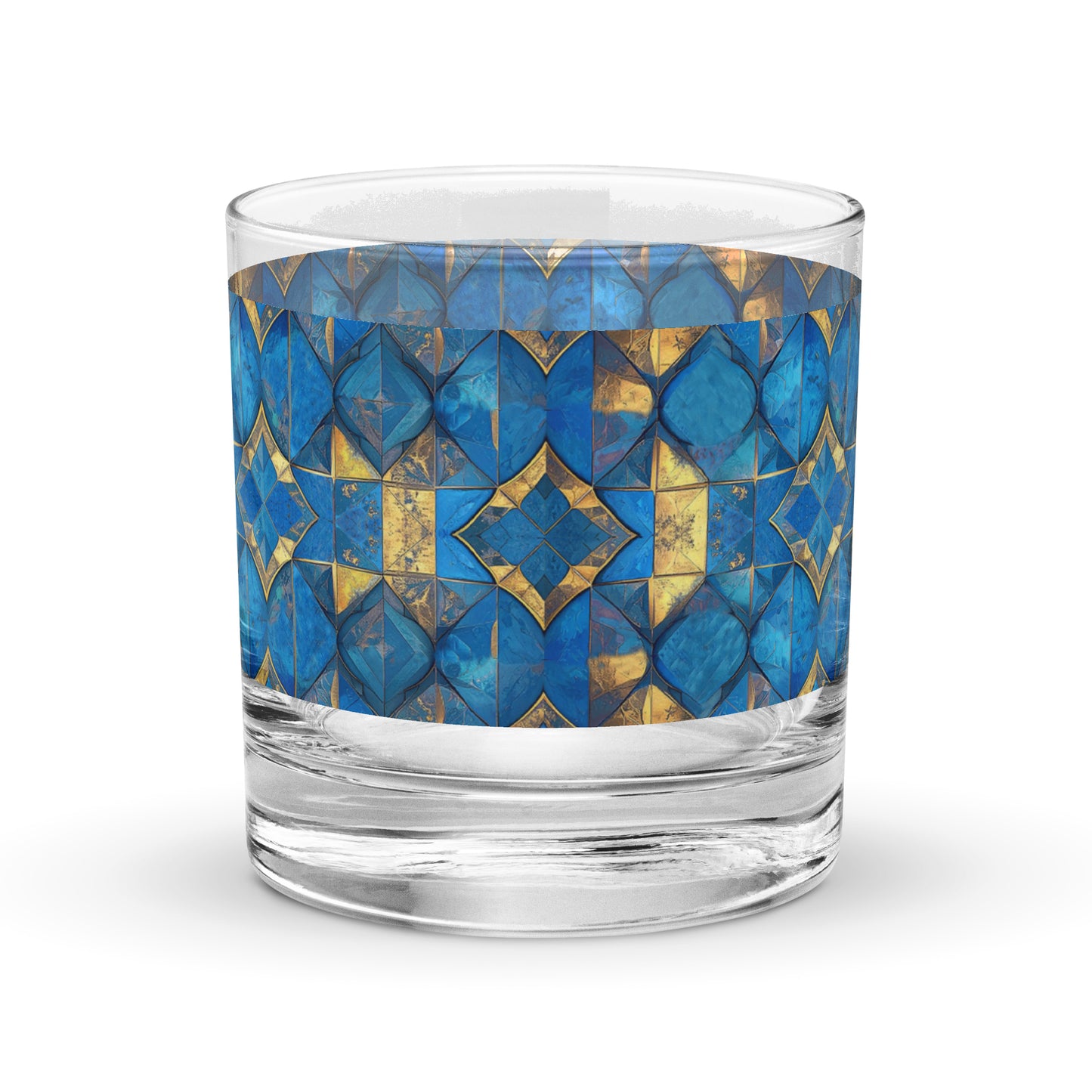 Glass rocks glass with turqoise and gold geometric design on a white background