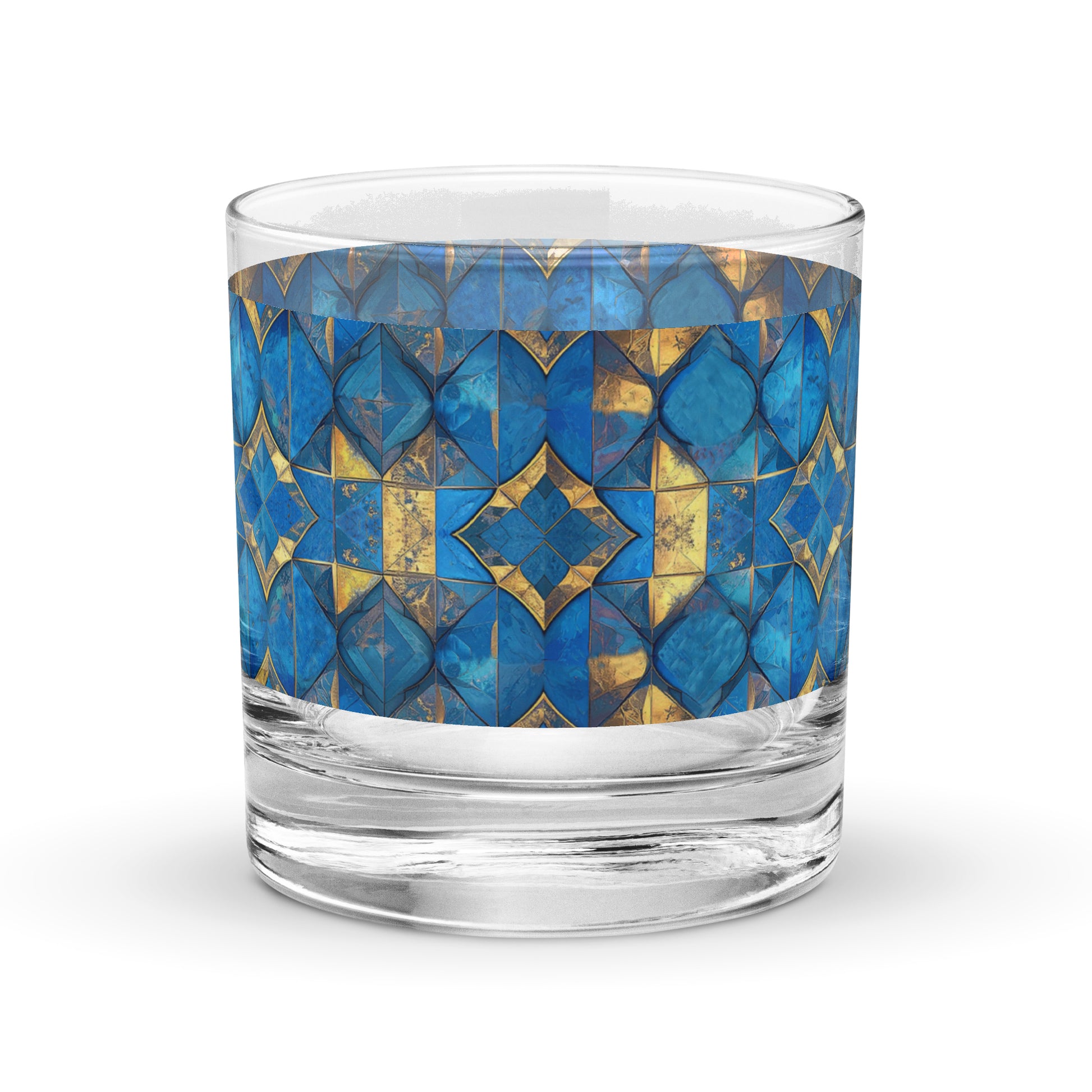 Glass rocks glass with turqoise and gold geometric design on a white background