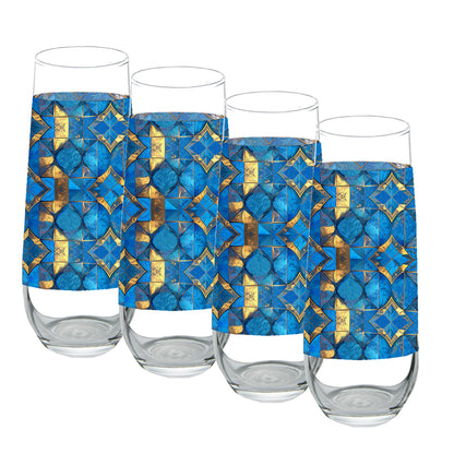 Four stemless champagn glasses with turqoise and gold geometric design on a white background