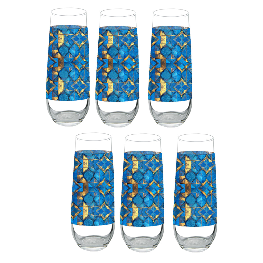 Set of six stemless champagne glasses with turqoise and gold geometric design on a white background