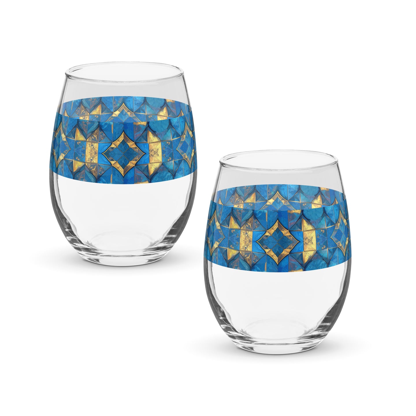 Two stemless wine glasses with turqoise and gold geometric design on a white background