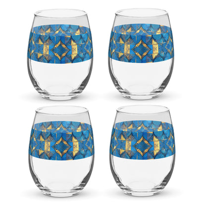 Four stemless wine glasses with turqoise and gold geometric design on a white background