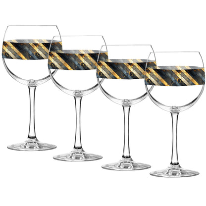 Set of four balloon wine glasses with black and gold striped design on a white background