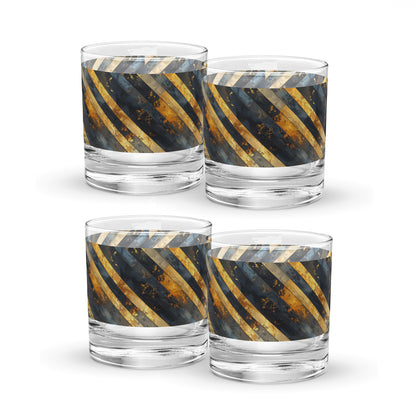 Four rock glasses with black and gold striped design on a white background