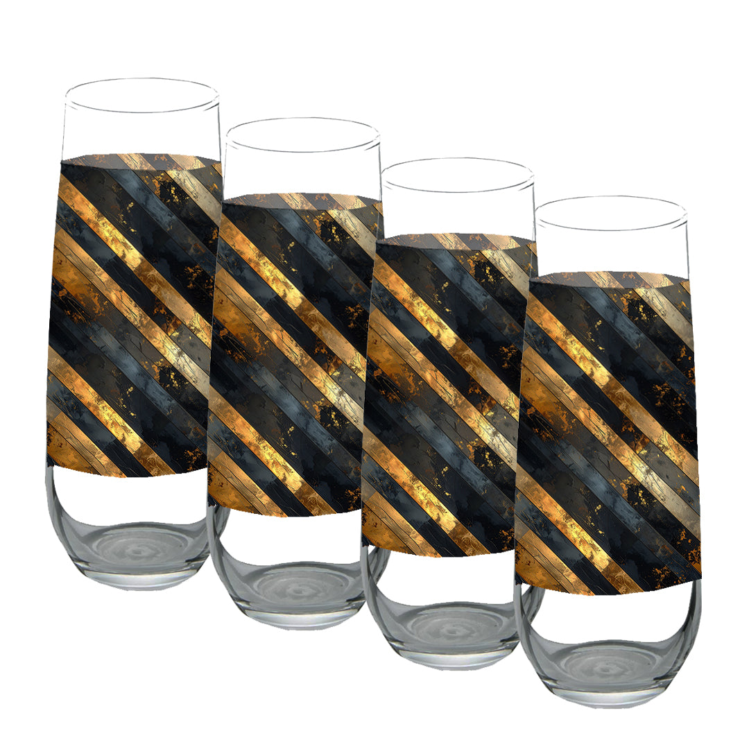 Four stemless champagne glasses with black and gold striped design on a white background
