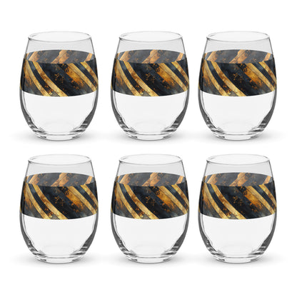 Set of six stemless wine glasses with black and gold striped designs on a white background