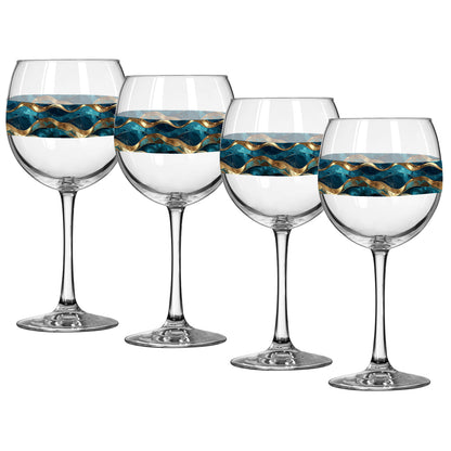 Set of four wine glasses with decorative blue and gold stripes on a white background