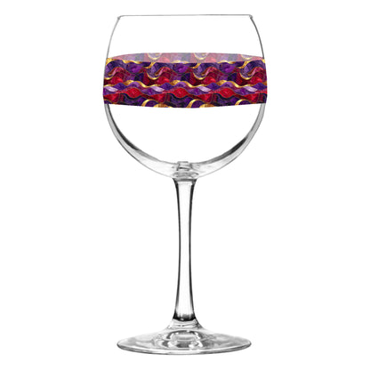Balloon wine glass with a purple and gold colorful wavy design on a white background