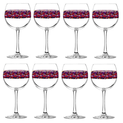 Set of eight balloon wine glasses with purple and gold colorful wavy design on a white background