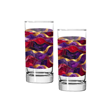 Two glass tumblers with colorful purple and gold wave pattern on a white background  