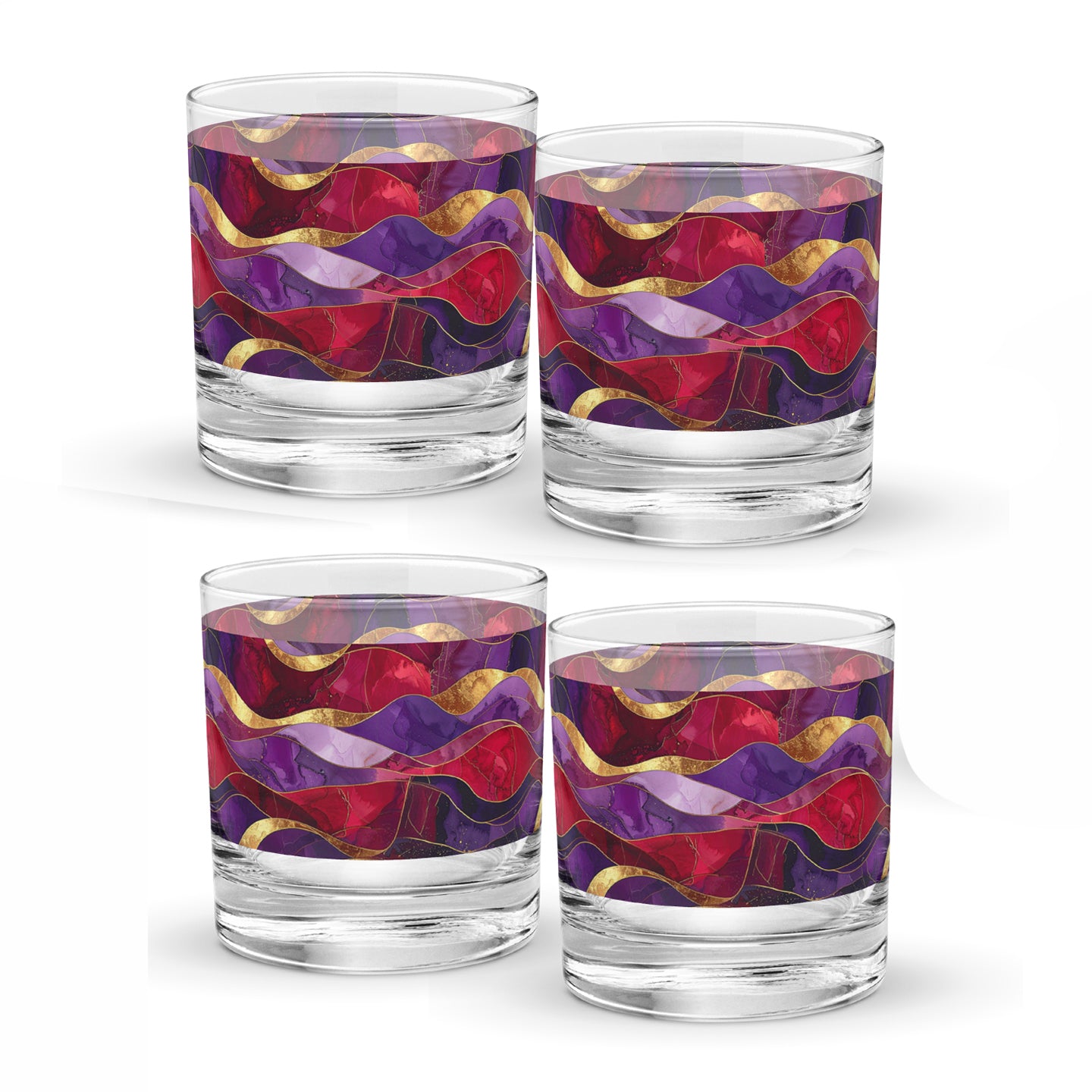 Four rock glasses with purple and gold colorful wavy patterns on a white background