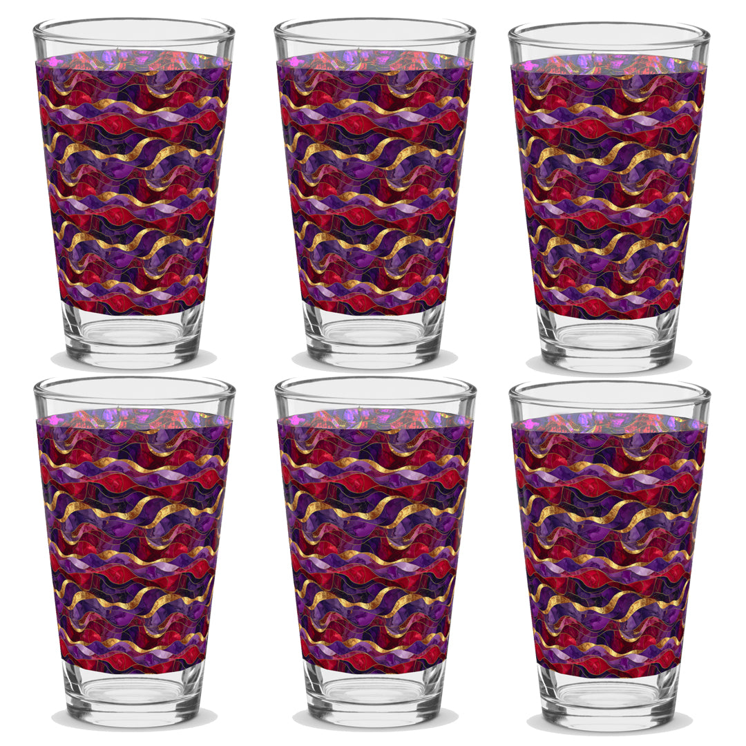 Set of six glass tumblers with a colorful wavy pattern on a white background