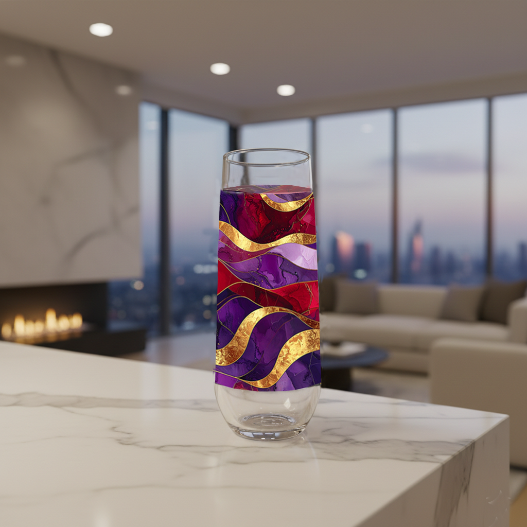 Fluid Marble stemless champagne glass with purple and gold design on a modern marble surface, and fireplace, sofa and large window with city view in background