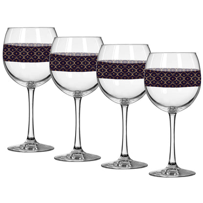 Four balloon wine glasses with violet and gold wrap design on a white background