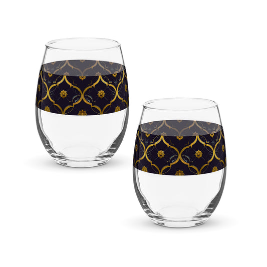 Two clear Midnight Marrakech stemless wine glasses with violet and gold wrap design on a white background