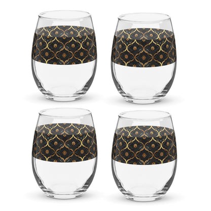 Four clear Midnight Marrakech stemless wine glasses with violetand gold wrap design on a white background