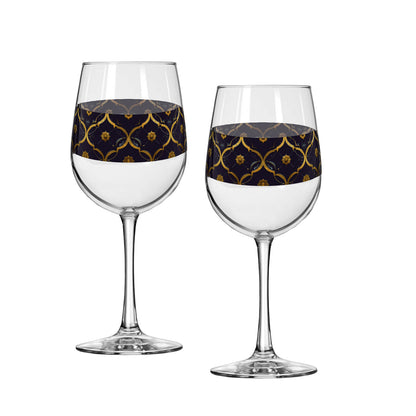 Two tall wine glasses with a violet and gold wrap design on a white background